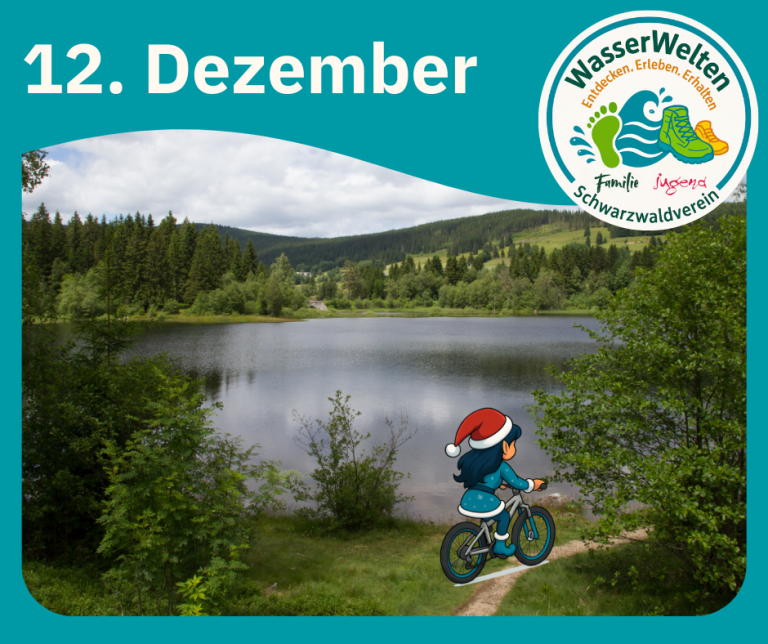 Die kleine Weihnachtselfe radelt durchs Grüne an einem See.